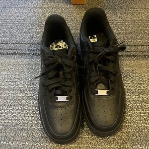 Black Air Force ones. Never warn.